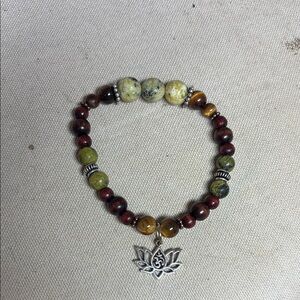 Elegant Beaded Bracelet with Silver Charm